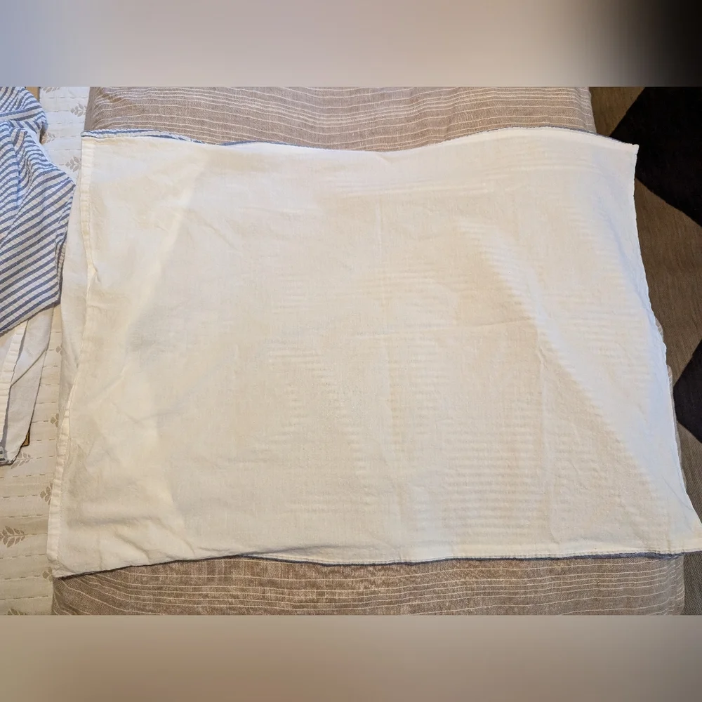 Pair of Nicole Miller embroidered seersucker cotton stripe shams